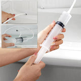 Reinigung des Abflusslochs im Kühlschrank