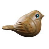 Handgefertigter Holzschnitzvogel